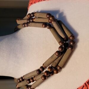 Metal and plastic beaded necklace